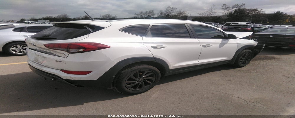 KM8J33A21GU133961 2016 HYUNDAI TUCSON photo no. 4