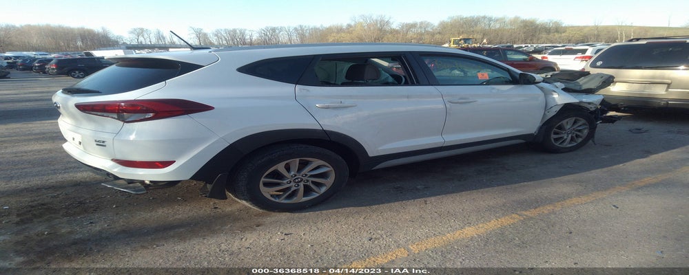 KM8J3CA25HU486527 2017 HYUNDAI TUCSON photo no. 4