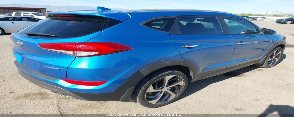 KM8J33A23GU194583 2016 HYUNDAI TUCSON photo no. 4