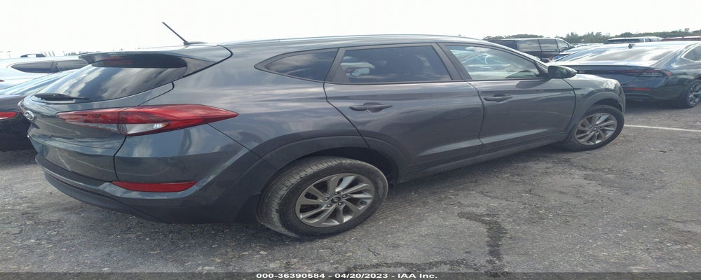 KM8J33A48GU180647 2016 HYUNDAI TUCSON photo no. 4