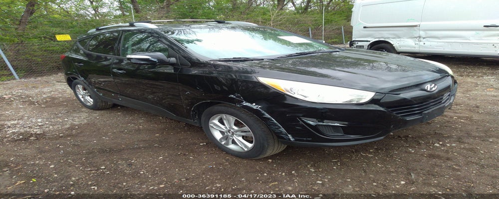 KM8JU3AC7CU459036 2012 HYUNDAI TUCSON photo no. 4