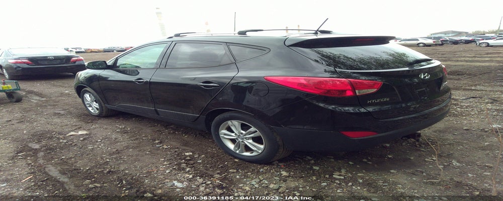 KM8JU3AC7CU459036 2012 HYUNDAI TUCSON photo no. 3