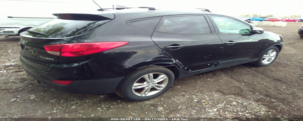 KM8JU3AC7CU459036 2012 HYUNDAI TUCSON photo no. 4