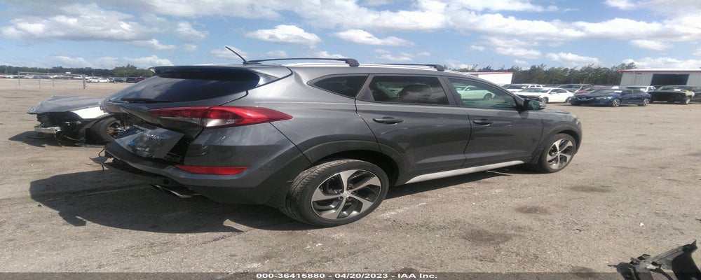 KM8J33A21HU458580 2017 HYUNDAI TUCSON photo no. 4