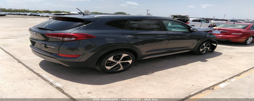 KM8J33A25HU366890 2017 HYUNDAI TUCSON photo no. 4