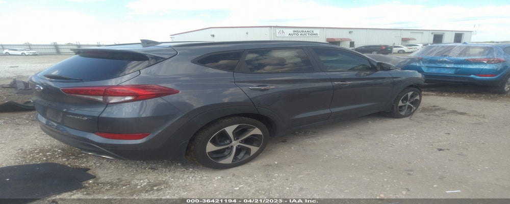 KM8J33A26GU033080 2016 HYUNDAI TUCSON photo no. 4