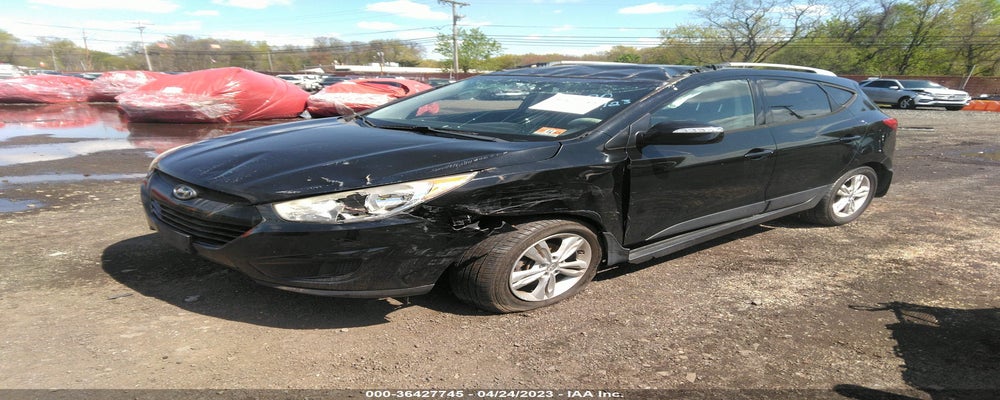 KM8JU3AC4CU388653 2012 HYUNDAI TUCSON photo no. 2