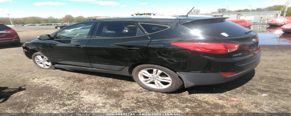 KM8JU3AC4CU388653 2012 HYUNDAI TUCSON photo no. 3