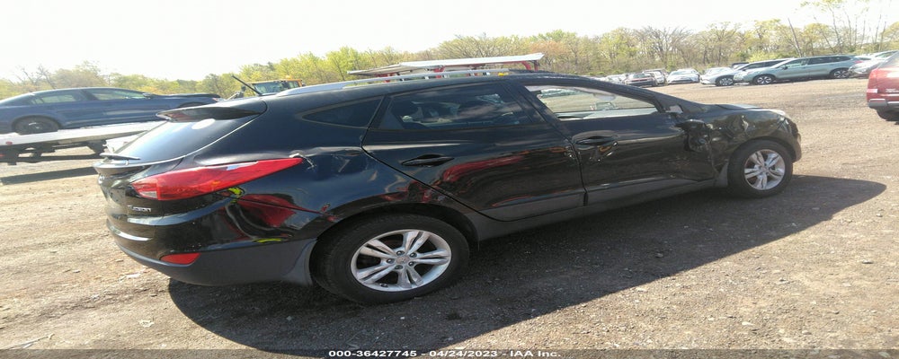 KM8JU3AC4CU388653 2012 HYUNDAI TUCSON photo no. 4