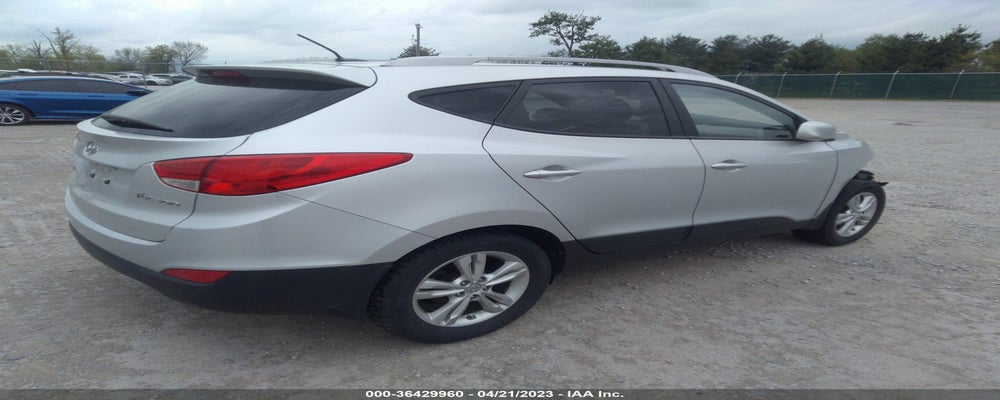 KM8JU3AC6BU175024 2011 HYUNDAI TUCSON photo no. 4