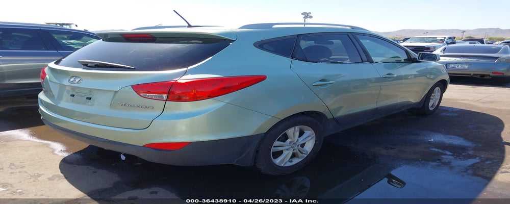 KM8JU3AC9BU155933 2011 HYUNDAI TUCSON photo no. 4