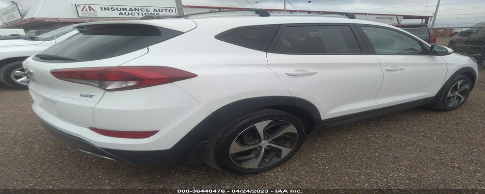 KM8J33A26GU194142 2016 HYUNDAI TUCSON photo no. 4