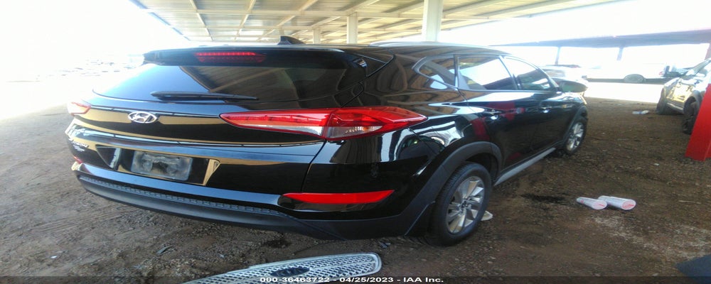 KM8J33A47HU561858 2017 HYUNDAI TUCSON photo no. 4