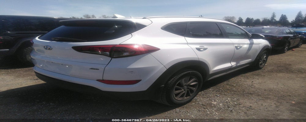 KM8J3CA41JU692399 2018 HYUNDAI TUCSON photo no. 4