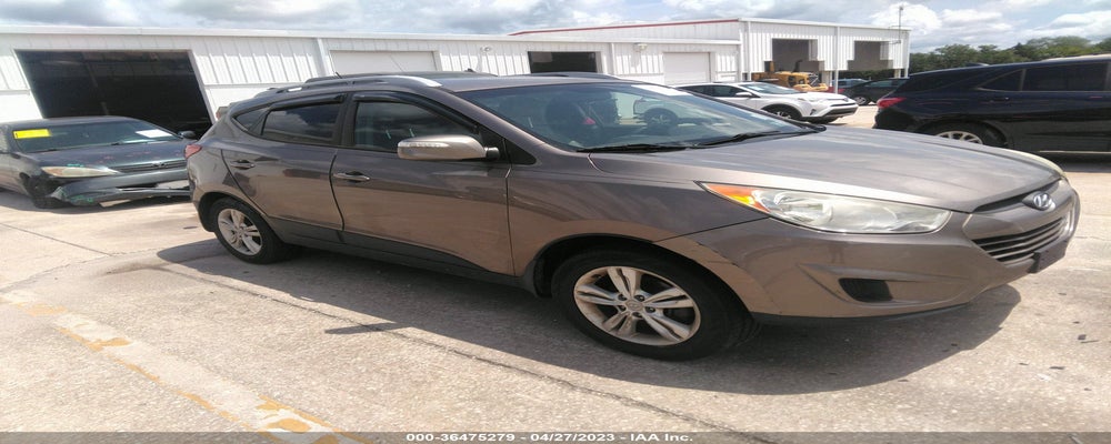 KMHJUCAC1CU542221 2012 HYUNDAI TUCSON photo no. 5
