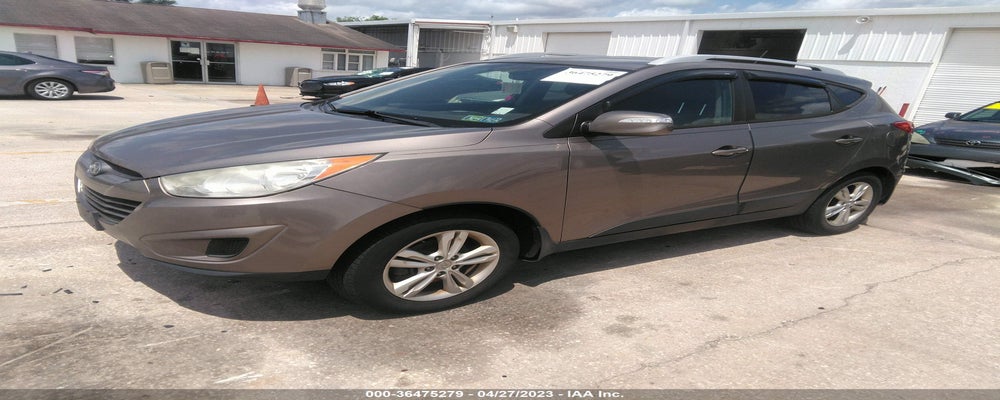 KMHJUCAC1CU542221 2012 HYUNDAI TUCSON photo no. 2