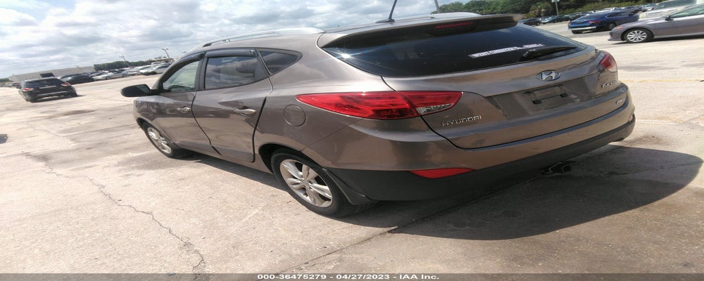 KMHJUCAC1CU542221 2012 HYUNDAI TUCSON photo no. 3