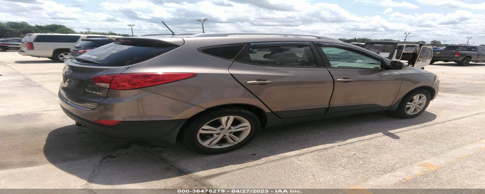 KMHJUCAC1CU542221 2012 HYUNDAI TUCSON photo no. 4
