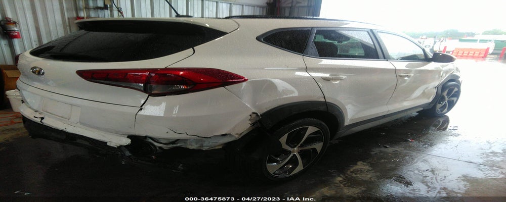 KM8J33A27HU572440 2017 HYUNDAI TUCSON photo no. 4