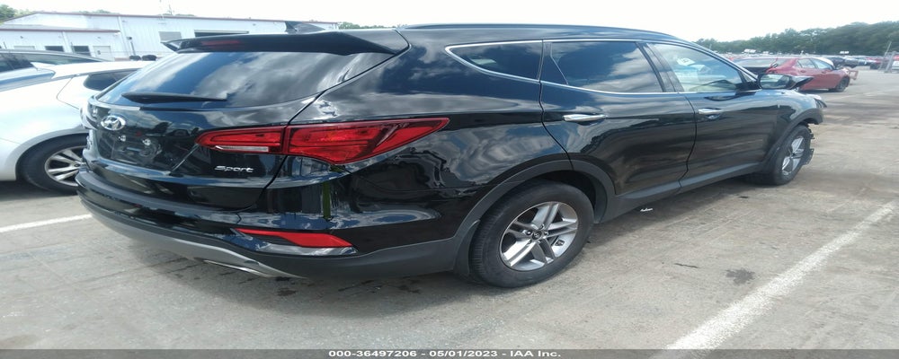 5NMZU3LB9HH017840 2017 HYUNDAI SANTA FE SPORT photo no. 4