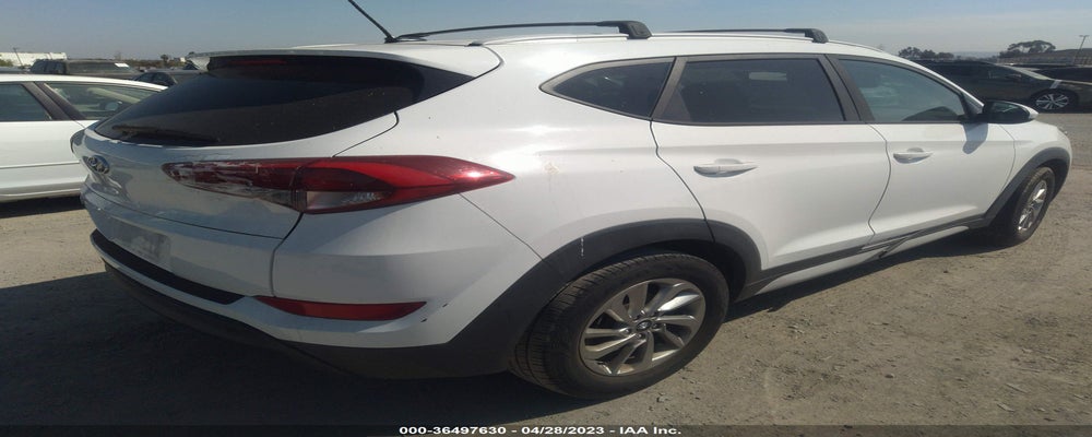 KM8J33A41HU464722 2017 HYUNDAI TUCSON photo no. 4