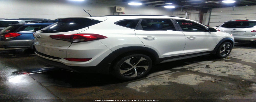 KM8J3CA27HU567982 2017 HYUNDAI TUCSON photo no. 4