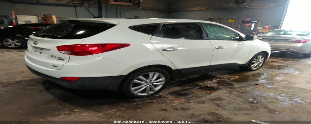 KM8JUCAC7CU461398 2012 HYUNDAI TUCSON photo no. 4