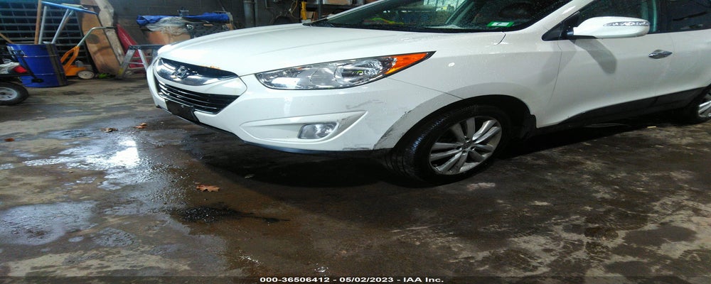 KM8JUCAC7CU461398 2012 HYUNDAI TUCSON photo no. 6