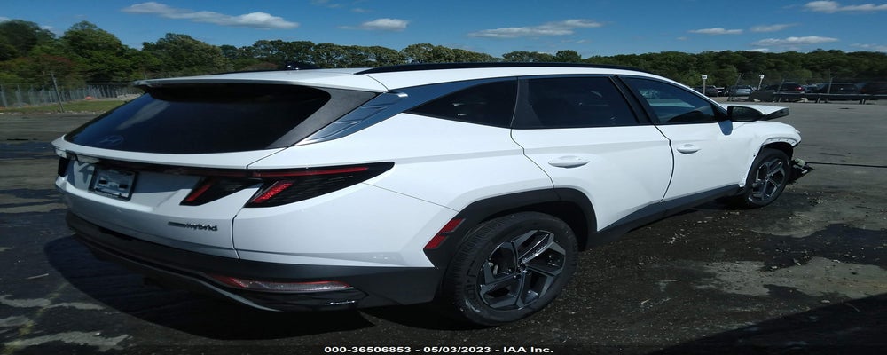 KM8JFCA1XNU052095 2022 HYUNDAI TUCSON HYBRID photo no. 4