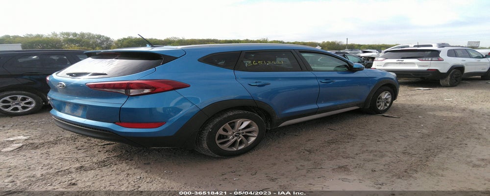 KM8J33A44HU506302 2017 HYUNDAI TUCSON photo no. 4