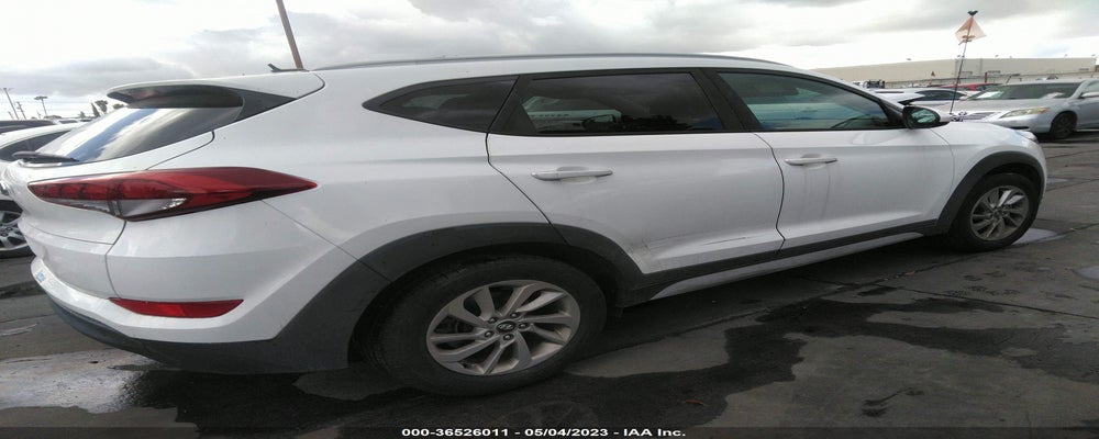 KM8J33A42HU508808 2017 HYUNDAI TUCSON photo no. 4