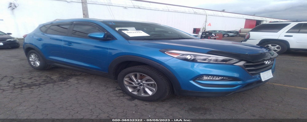 KM8J33A43GU115754 2016 HYUNDAI TUCSON photo no. 4