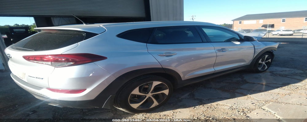 KM8J33A25GU130674 2016 HYUNDAI TUCSON photo no. 4