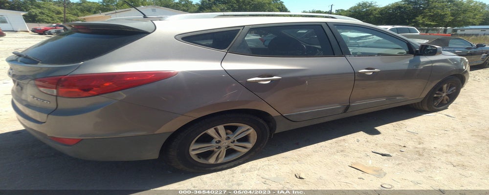 KM8JU3AC2BU300844 2011 HYUNDAI TUCSON photo no. 4