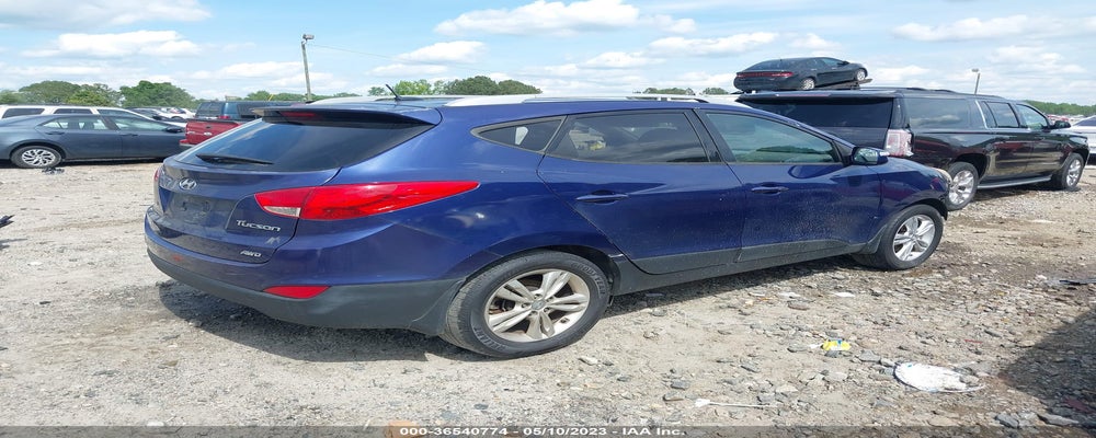 KM8JUCAC8DU590526 2013 HYUNDAI TUCSON photo no. 4