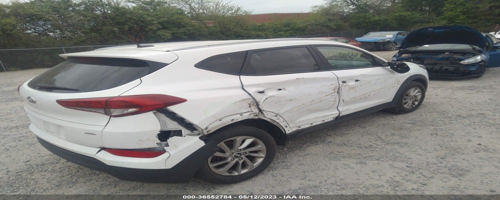 KM8J3CA48GU256142 2016 HYUNDAI TUCSON photo no. 4