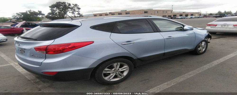 KM8JU3AC1BU257999 2011 HYUNDAI TUCSON photo no. 4