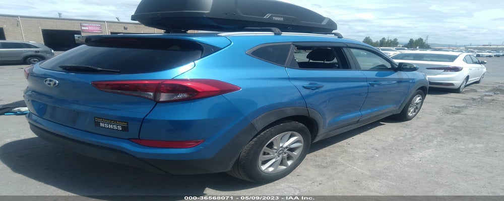 KM8J33A49GU238104 2016 HYUNDAI TUCSON photo no. 4