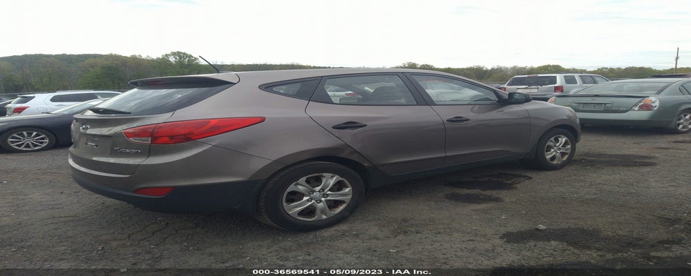 KM8JT3AB2BU201273 2011 HYUNDAI TUCSON photo no. 4