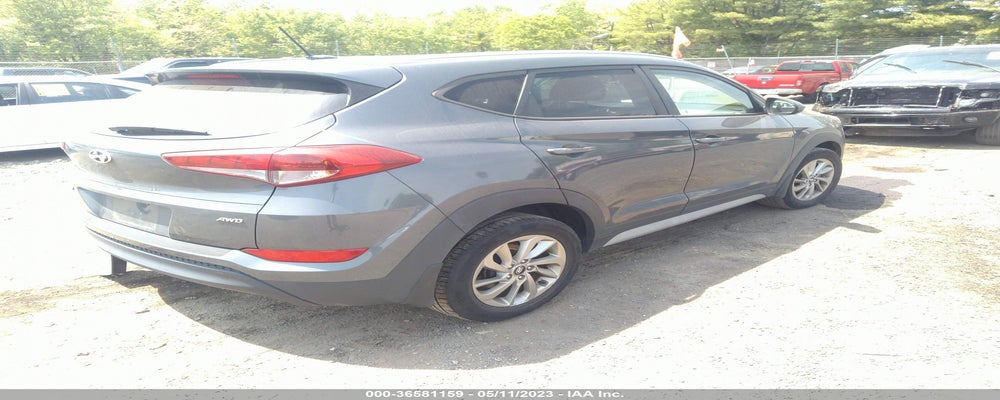 KM8J3CA46HU575198 2017 HYUNDAI TUCSON photo no. 4
