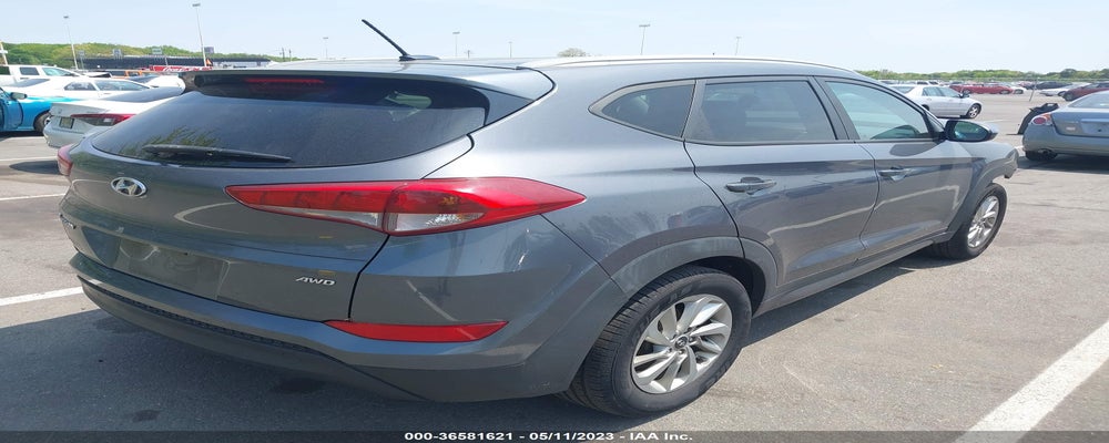 KM8J3CA44GU174490 2016 HYUNDAI TUCSON photo no. 4