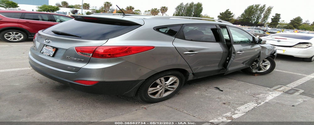 KM8JUCAC9BU120390 2011 HYUNDAI TUCSON photo no. 4
