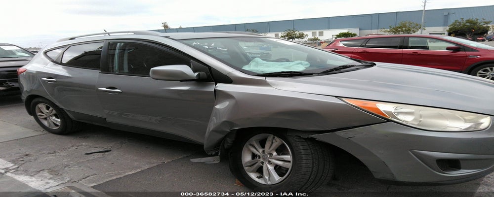 KM8JUCAC9BU120390 2011 HYUNDAI TUCSON photo no. 6