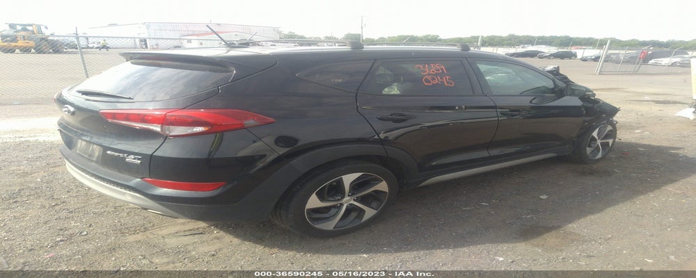 KM8J3CA20HU330332 2017 HYUNDAI TUCSON photo no. 4