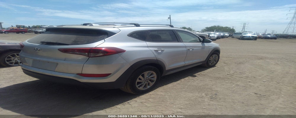 KM8J33A48JU693159 2018 HYUNDAI TUCSON photo no. 4