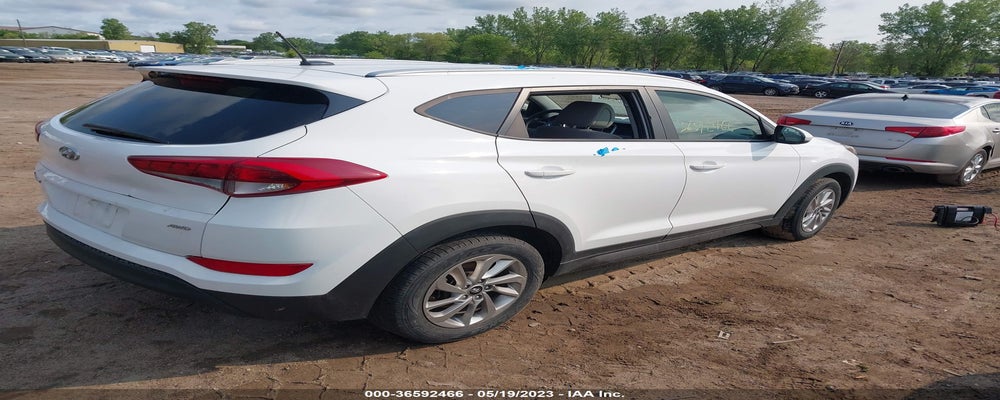 KM8J3CA43GU101384 2016 HYUNDAI TUCSON photo no. 4