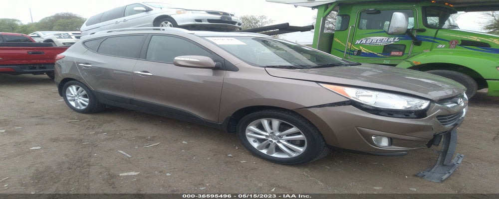 KM8JUCAC6DU582554 2013 HYUNDAI TUCSON photo no. 5