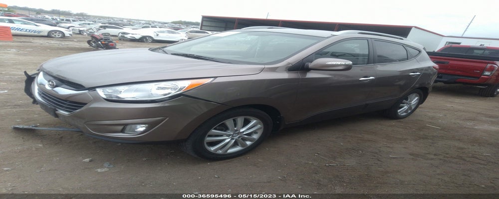 KM8JUCAC6DU582554 2013 HYUNDAI TUCSON photo no. 2