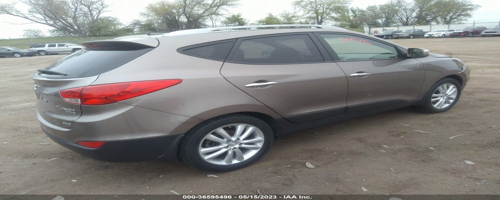 KM8JUCAC6DU582554 2013 HYUNDAI TUCSON photo no. 4