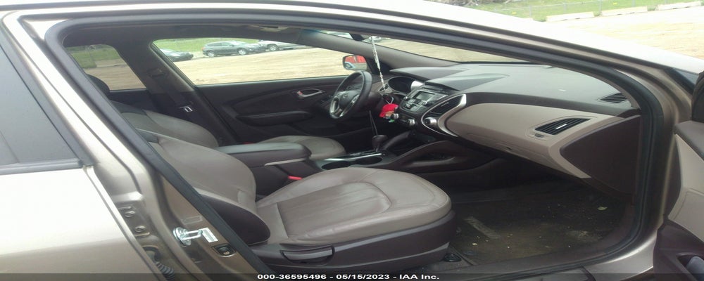 KM8JUCAC6DU582554 2013 HYUNDAI TUCSON photo no. 5